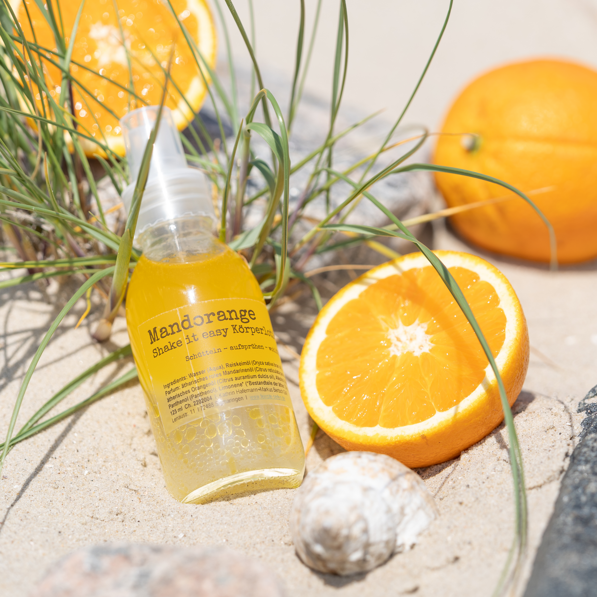 Mandorange Bodylotion mit Reiskeimöl in Glasflasche mit Lotionspender